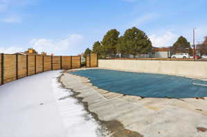 Community pool with a patio area
