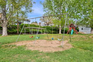 Community playground featuring a yard