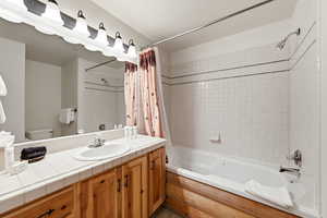 Full bathroom with vanity and tiled shower / bath