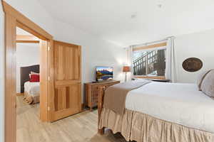 Bedroom featuring light wood-style flooring