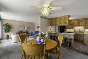 Dining room featuring kitchen and living room access