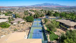Aerial view of residential area featuring mountains