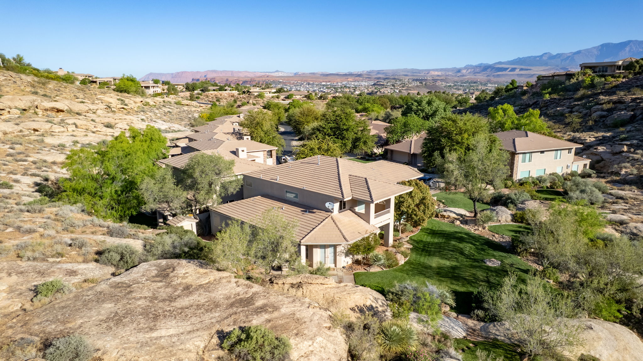 View from above of property with a mountainous background