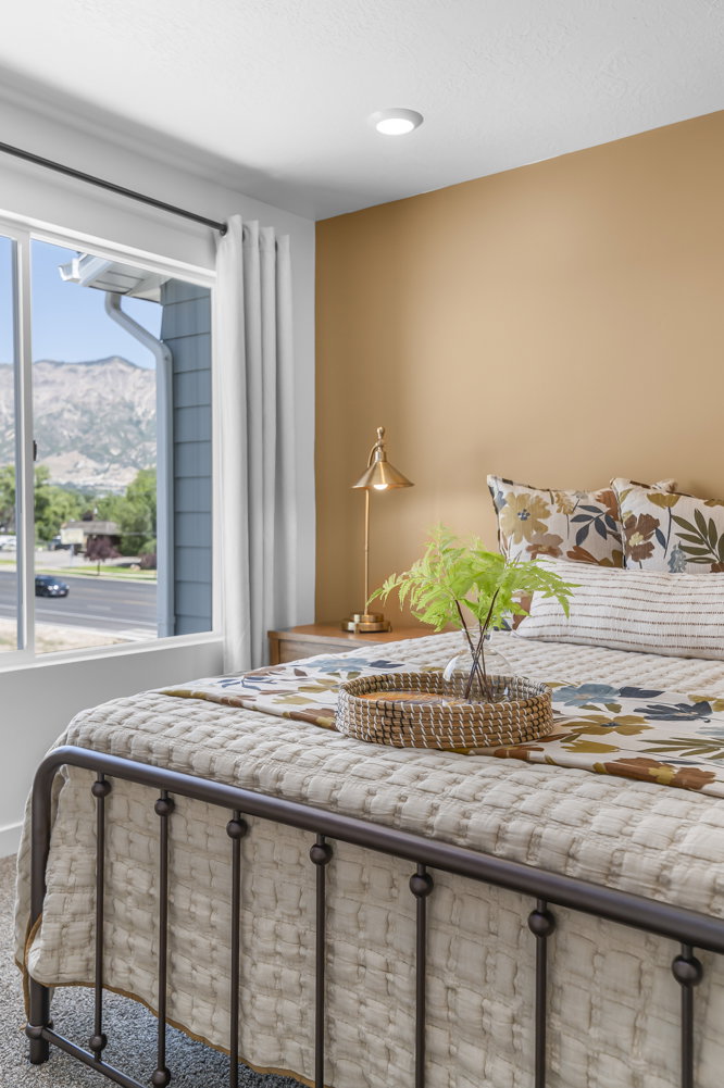 Carpeted bedroom featuring a mountain view
