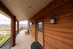 Wooden terrace featuring a mountain view