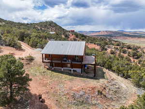 View from above of property featuring a mountainous background