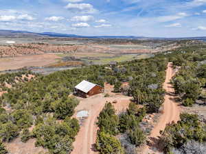 Overview of rural landscape with a mountain backdrop