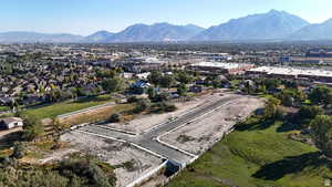 Aerial view of residential area with a mountainous background