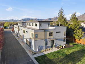 View of property with a mountain view
