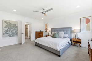 Bedroom with a ceiling fan, light carpet, ornamental molding, and recessed lighting
