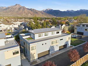 Aerial view of residential area with a mountainous background