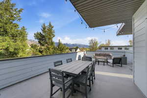 Balcony featuring a mountain view and outdoor lounge area