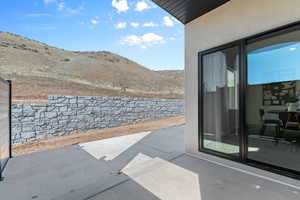 View of patio / terrace with a mountain view