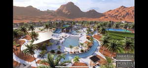 Aerial view of a mountainous background and a pool area