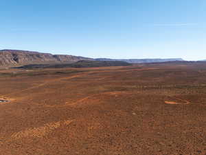 View of mountain backdrop featuring rural landscape