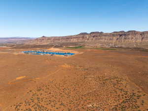 Aerial view of a mountainous background and a desert landscape