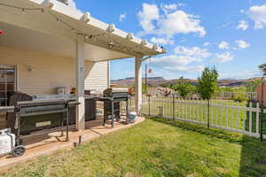 View of yard with a patio area and a mountain view