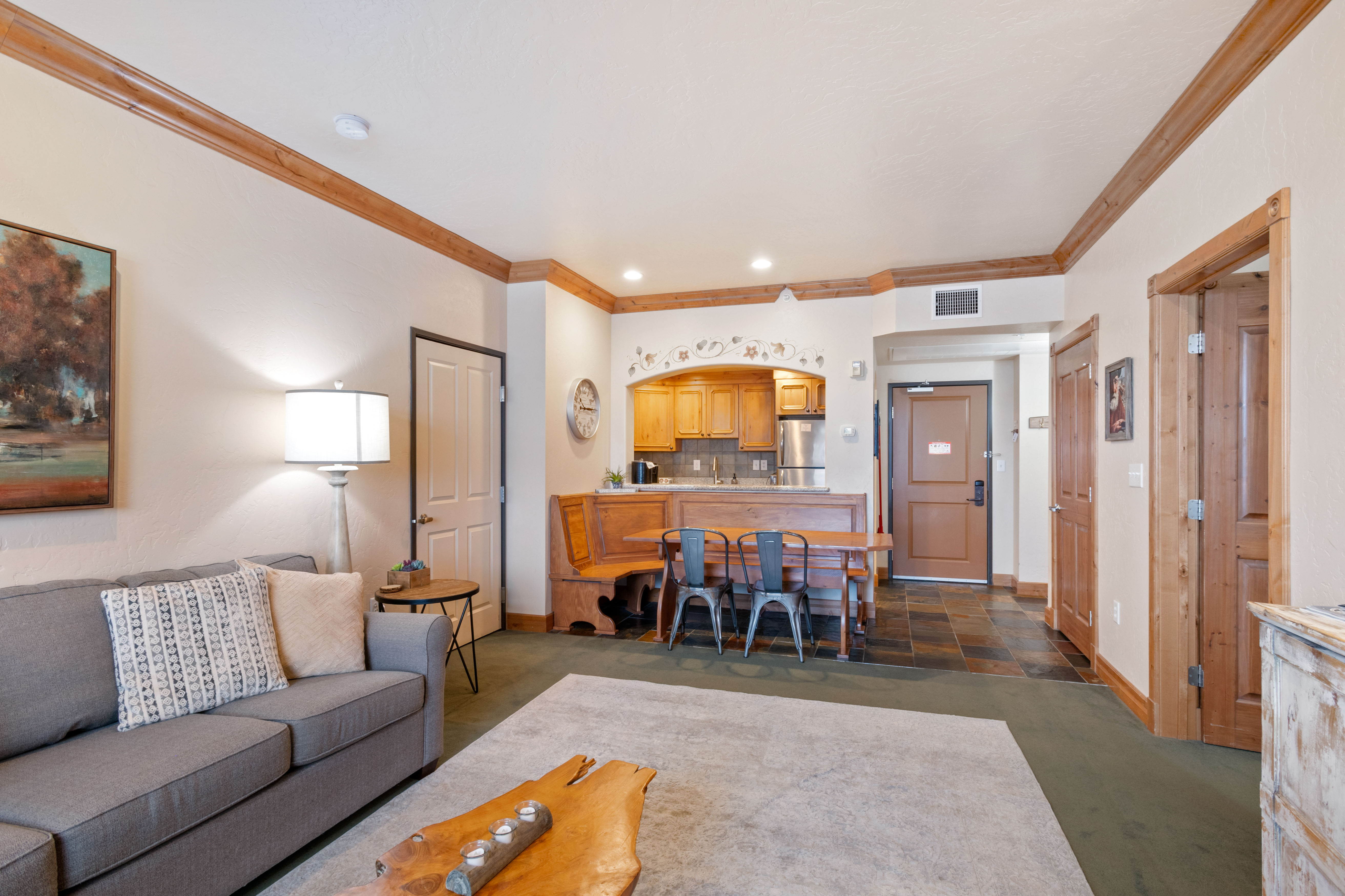 Living room featuring crown molding and recessed lighting