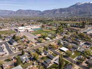 Aerial view of property's location with nearby suburban area and High school