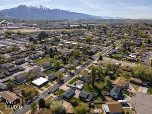 Aerial view of residential area with a mountainous background