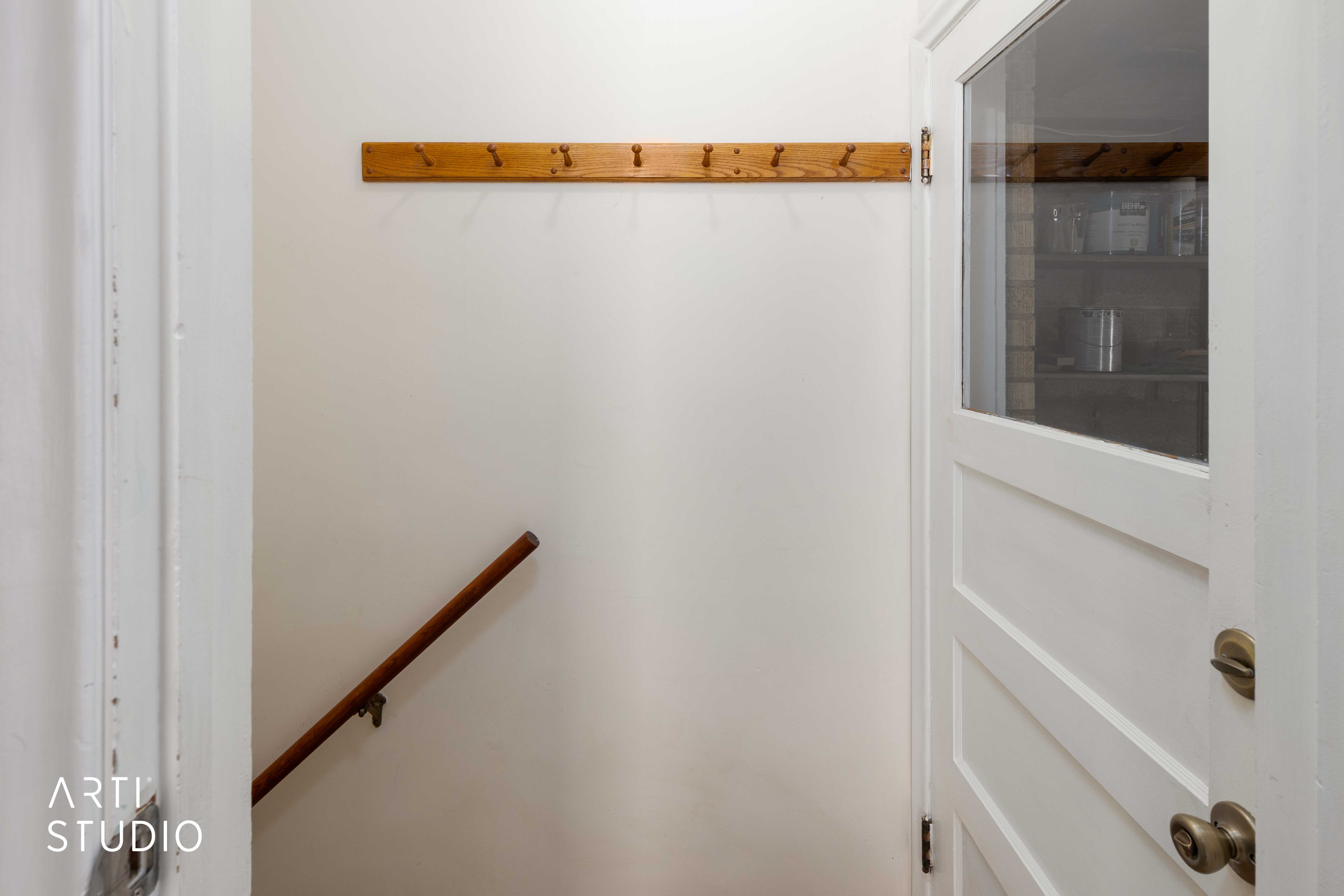 Doorway to garage, and stairs