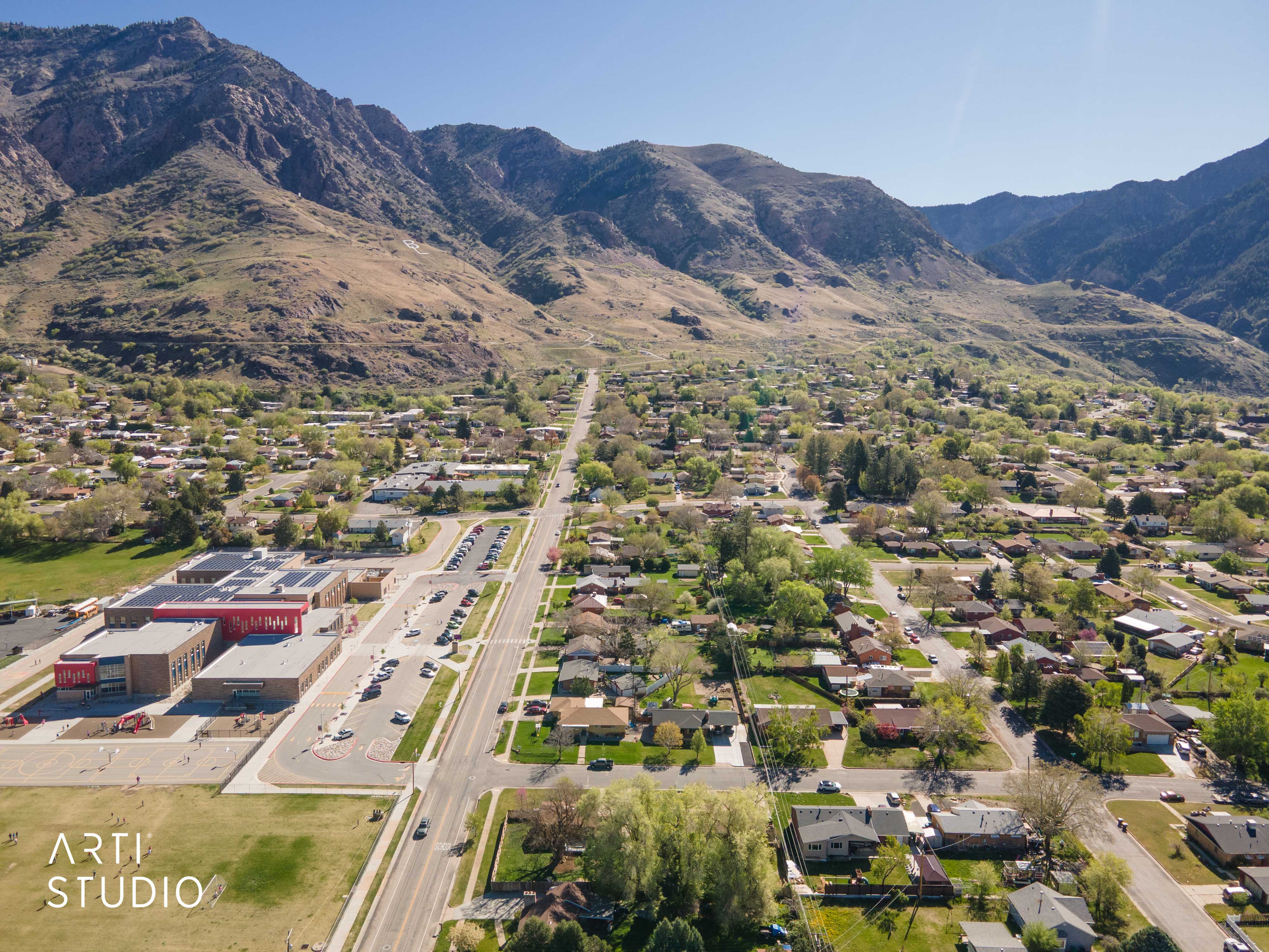 Aerial view of residential area with a mountain backdrop