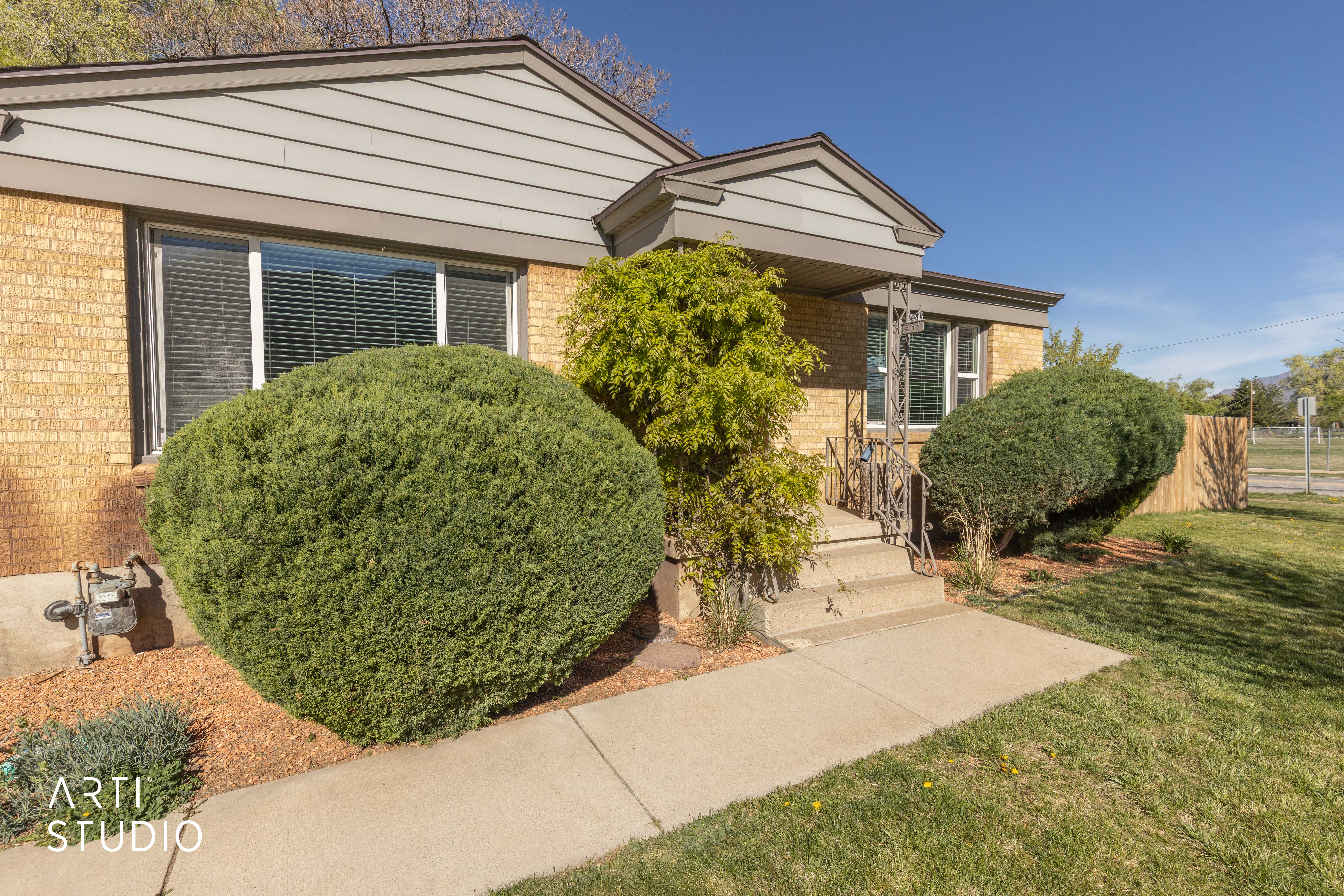 View of front of property showing entry walk and front porch