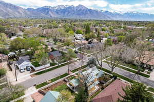 Aerial perspective of suburban area with a mountainous background