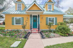 View of front of home with a standing seam roof
