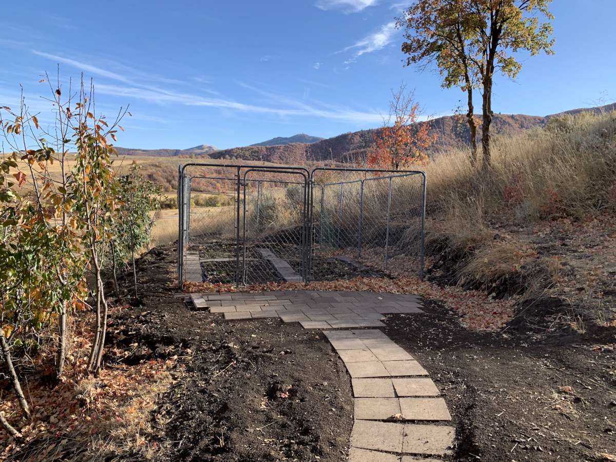 View of yard featuring a gate and a mountain view