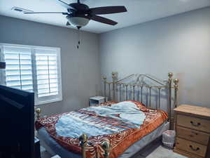 Bedroom with a ceiling fan