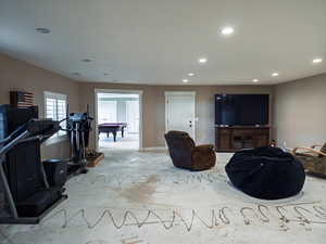 Living area with billiards and recessed lighting
