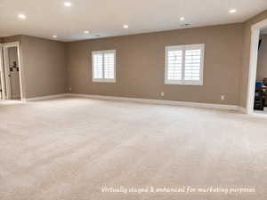 Virtually staged and enhanced for marketing purposes to illustrate potential appearance with carpet installed