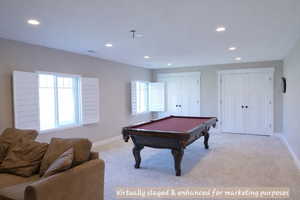 Virtually staged and enhanced for marketing purposes to illustrate potential appearance with carpet installed