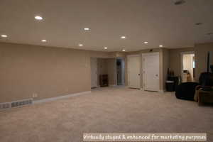 Virtually staged and enhanced for marketing purposes to illustrate potential appearance with carpet installed