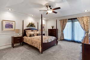 Bedroom featuring recessed lighting, ornamental molding, carpet floors, a ceiling fan, and a decorative wall