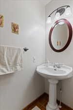 Bathroom with dark tile patterned floors