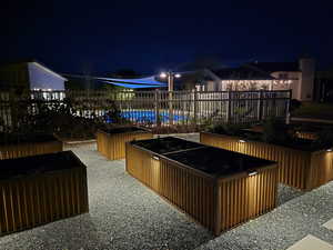 Night lights from garden looking towards the pool area