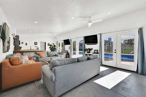 3 large french doors into the pool house and double TV's for parties