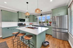 Custom kitchen with stainless farm sink, and large island