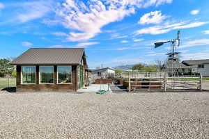 View from pens of garden room and pool house
