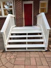 Entrance to property with brick siding