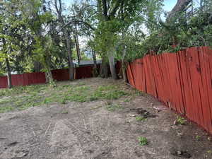 View of fenced backyard
