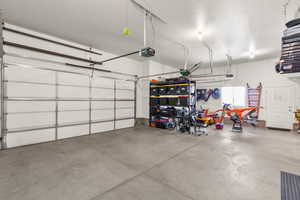 Garage featuring a garage door opener