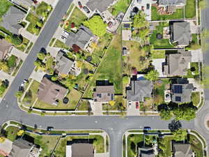 Aerial view of residential area with property parcel outlined
