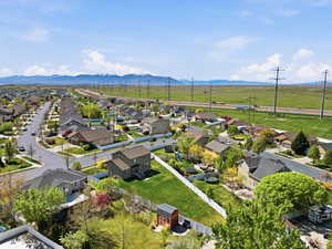 Aerial view of residential area with a mountainous background
