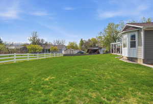 View of fenced backyard