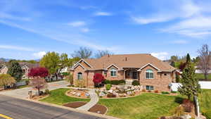 View of front of property featuring brick siding