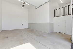 Garage featuring a garage door opener