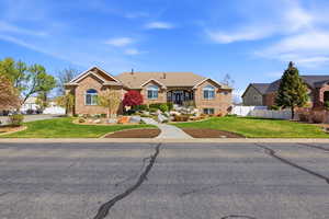 View of front of house featuring brick siding